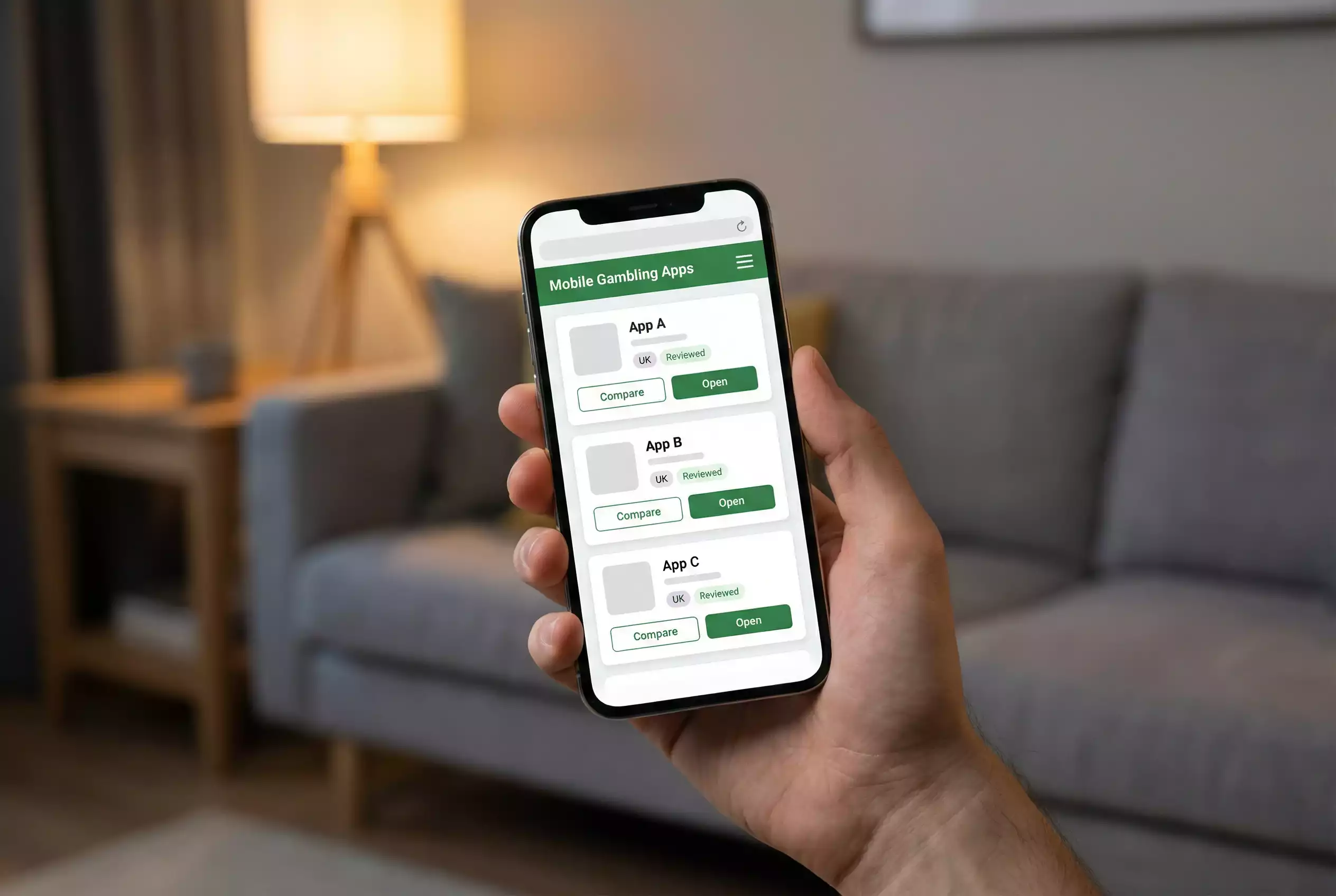 Hand holding a smartphone displaying a clean gambling site interface in a modern living room setting